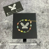 Pulsera de acero inoxidable con mal de ojo bañada en oro