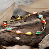 Pulsera de acero inoxidable con mal de ojo bañada en oro
