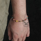 Pulsera de acero inoxidable con mal de ojo bañada en oro