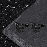 Boucles d'oreilles à tige en argent sterling avec tête de mort gothique