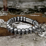Surrounded Skulls Stainless Steel Bracelet | Gthic.com