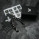 Bracciale intrecciato in acciaio inossidabile con fibbia a teschio a doppia testa