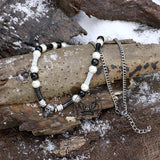 Collier tête de mort en acier inoxydable perlé de pierres précieuses multicolores