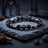 Herren-Perlenarmband aus Edelstahl mit Kreuzschädel-Motiv