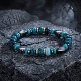 Herren-Perlenarmband aus Edelstahl mit Kreuzschädel-Motiv