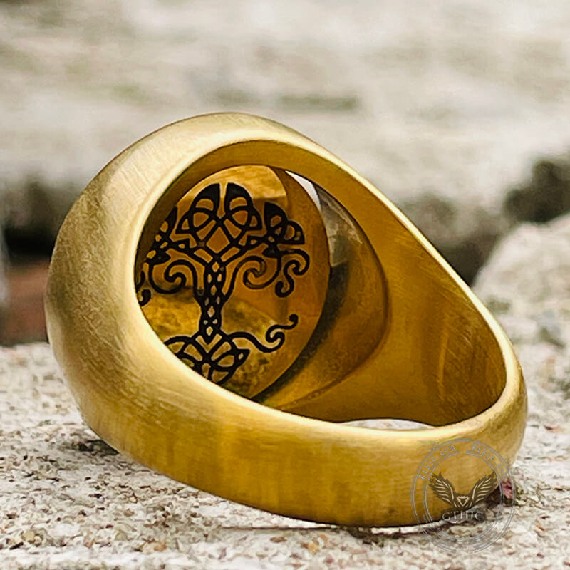 Anillo giratorio de acero inoxidable con símbolos vikingos dorados
