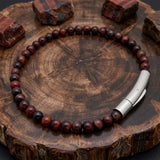 Herren-Perlenarmband aus Edelstahl mit Kreuzschädel-Motiv