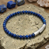 Herren-Perlenarmband aus Edelstahl mit Kreuzschädel-Motiv