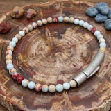 Herren-Perlenarmband aus Edelstahl mit Kreuzschädel-Motiv