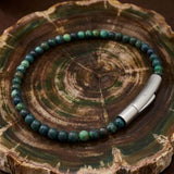 Herren-Perlenarmband aus Edelstahl mit Kreuzschädel-Motiv