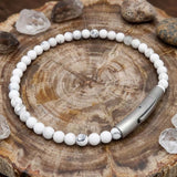 Herren-Perlenarmband aus Edelstahl mit Kreuzschädel-Motiv