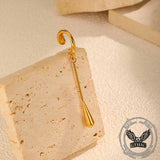 Clips de oreja de acero inoxidable con dije de cruz negra