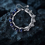 Herren-Perlenarmband aus Edelstahl mit Kreuzschädel-Motiv