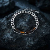 Herren-Perlenarmband aus Edelstahl mit Kreuzschädel-Motiv