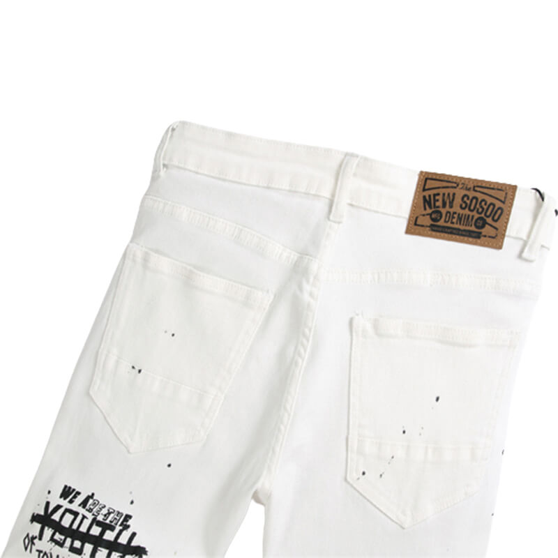 Pantalones pitillo de algodón con estampado de monogramas blancos