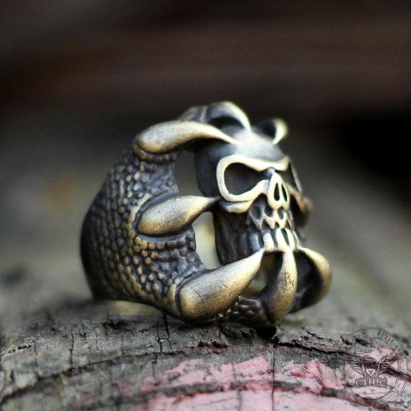 Anello teschio in argento sterling in ottone con artiglio di drago