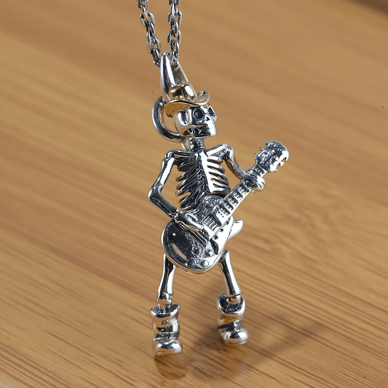 Pendentif tête de mort en argent sterling jouant de la guitare