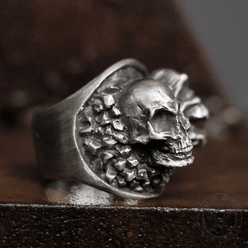 Anello teschio in ottone con anima strappata in argento sterling