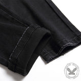 Pantaloni punk in cotone nero con teschio