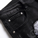 Punk-Hose aus schwarzer Baumwolle mit Totenkopf-Motiv